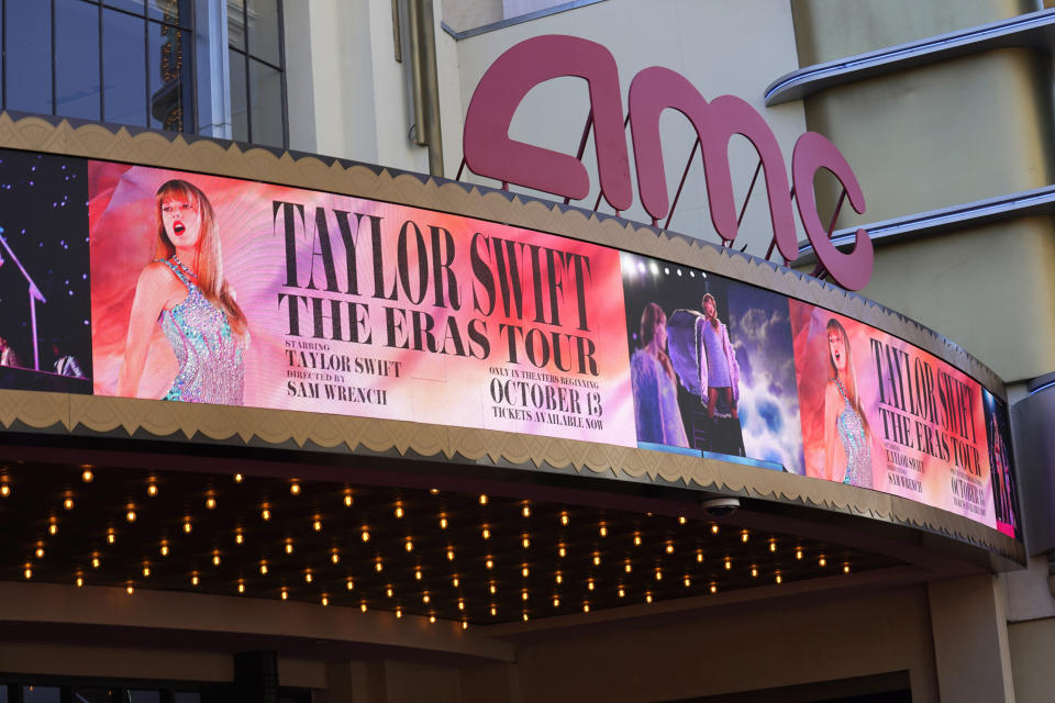 A marquee featuring the concert film "Taylor Swift: The Eras Tour" is seen prior to the world premiere on Wednesday, Oct. 11, 2023, at AMC The Grove 14 in Los Angeles. (AP Photo/Chris Pizzello)