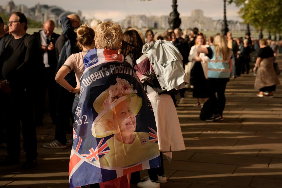 The line stretches down the South Bank in London (AP)