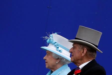 Britain's Queen Elizabeth and Prince Philip arrive for the fourth day of racing at Royal Ascot in southern England in this June 18, 2010 file photo. REUTERS/Stefan Wermuth/Files