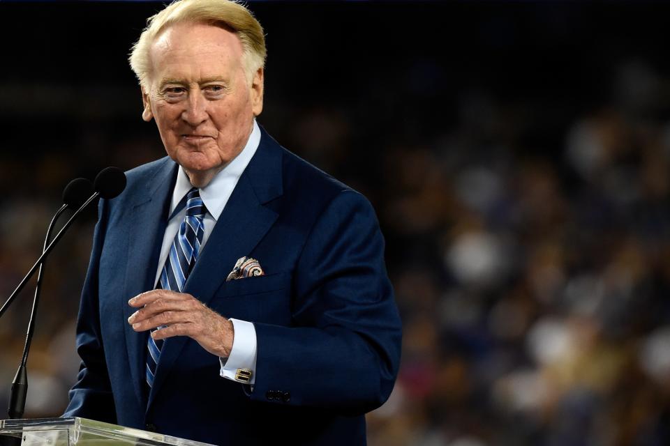 <p>Dodgers announcer Vin Scully addresses the crowd during a retirement ceremony in his honor before the game at Dodger Stadium on September 23, 2016 in Los Angeles, California. Scully is retiring after 67 years with the Dodgers. (Photo by Lisa Blumenfeld/Getty Images) </p>