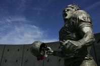 Pat Tillman, who was killed in Afghanistan in 2004 after quitting the NFL's Arizona Cardinals to join the U.S. Army Rangers, was honored with a statue outside the State Farm Stadium before the game between the Arizona Cardinals and the Dallas Cowboys November 12, 2006 in Glendale, Arizona. (Photo by Robert Laberge/Getty Images)