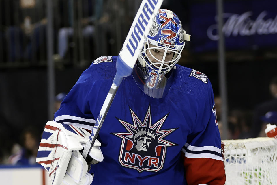 New York Rangers goaltender Igor Shesterkin reacts after giving up a goal to the Washington Capitals during the first period of an NHL hockey game Tuesday, Dec. 27, 2022, in New York. The Capitals won 4-0. (AP Photo/Adam Hunger)