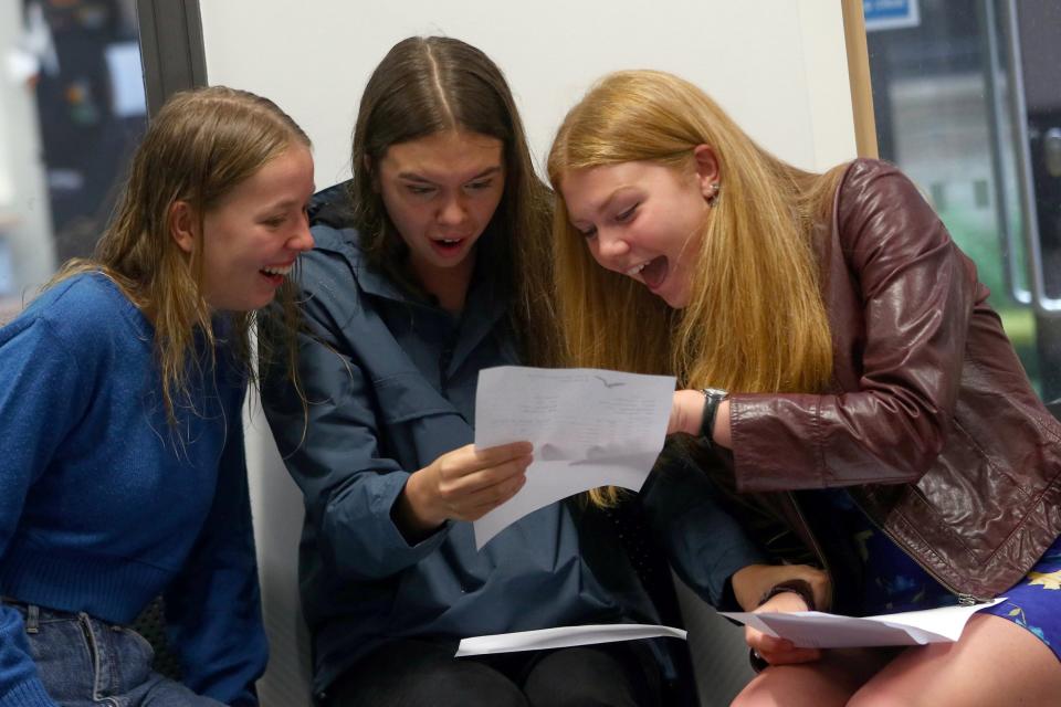 Students react as they receive their 'A' level results at Stoke Newington School and Sixth Form in London: REUTERS