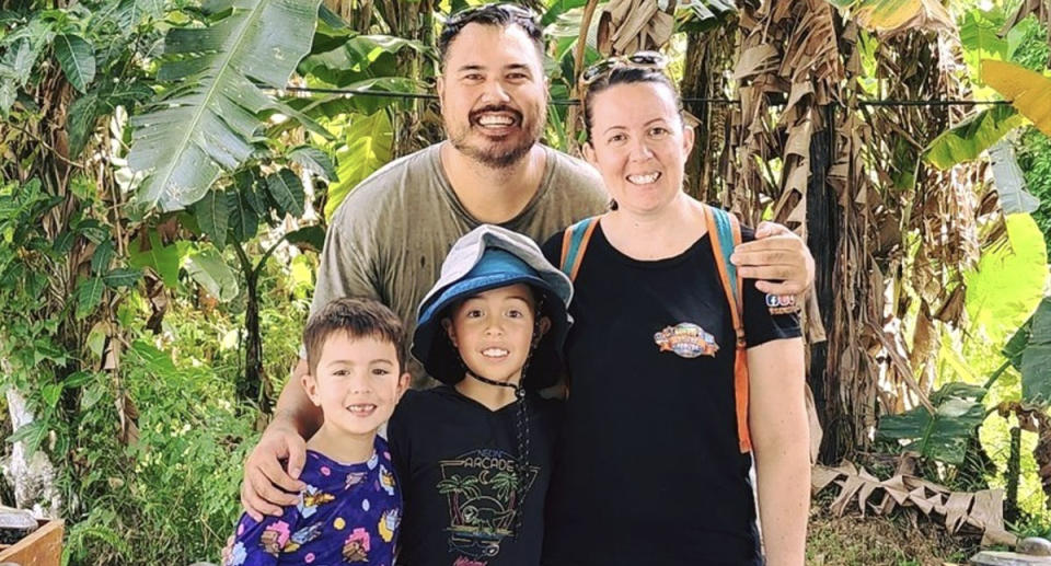 The Mitchell family smiling for the camera as they escape the cost of living.