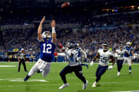 <p>Andrew Luck #12 of the Indianapolis Colts dives for a catch in the game against the Tennessee Titans in the second quarter at Lucas Oil Stadium on November 18, 2018 in Indianapolis, Indiana. (Photo by Bobby Ellis/Getty Images) </p>