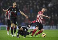 Southampton's James Ward Prowse in action with Liverpool's Adam Lallana Reuters / Dylan Martinez Livepic