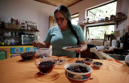 Gabriela Soto prepares insects for lunch in Grecia