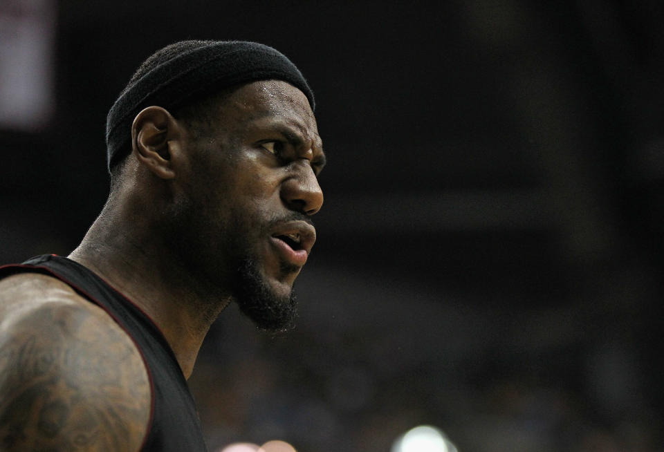 INDIANAPOLIS, IN - MAY 20: Lebron James #6 of the Miami Heat reacts after dunking the ball against the Indiana Pacers in Game Four of the Eastern Conference Semifinals in the 2012 NBA Playoffs at Bankers Life Fieldhouse on May 20, 2012 in Indianapolis, Indiana. The Heat defeated the Pacers 101-93. NOTE TO USER: User expressly acknowledges and agrees that, by downloading and/or using this photograph, User is consenting to the terms and conditions of the Getty Images License Agreement. (Photo by Jonathan Daniel/Getty Images)