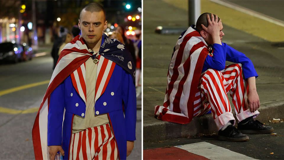 A man dressed in red-white-and-blue protested against Trump and later sat on the curb. Photo: AP