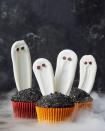 <p>Boo! Scarily cute ghosts are the perfect toppers for decadent chocolate cupcakes.</p><p>Get the recipe from <a href="https://www.goodhousekeeping.com/food-recipes/party-ideas/a28591745/white-chocolate-ghost-cupcakes-recipe/" rel="nofollow noopener" target="_blank" data-ylk="slk:Good Housekeeping;elm:context_link;itc:0;sec:content-canvas" class="link ">Good Housekeeping</a>.</p>