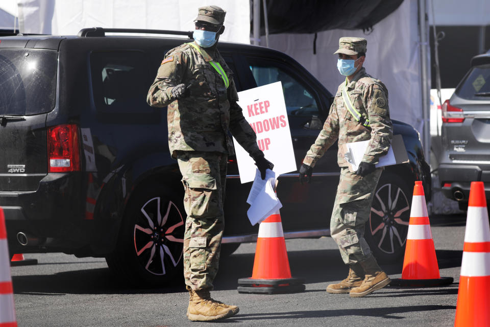 Members of the National Guard at a newly opened coronavirus testing site in Brooklyn, N.Y., on April 11, 2020. (Spencer Platt / Getty Images)