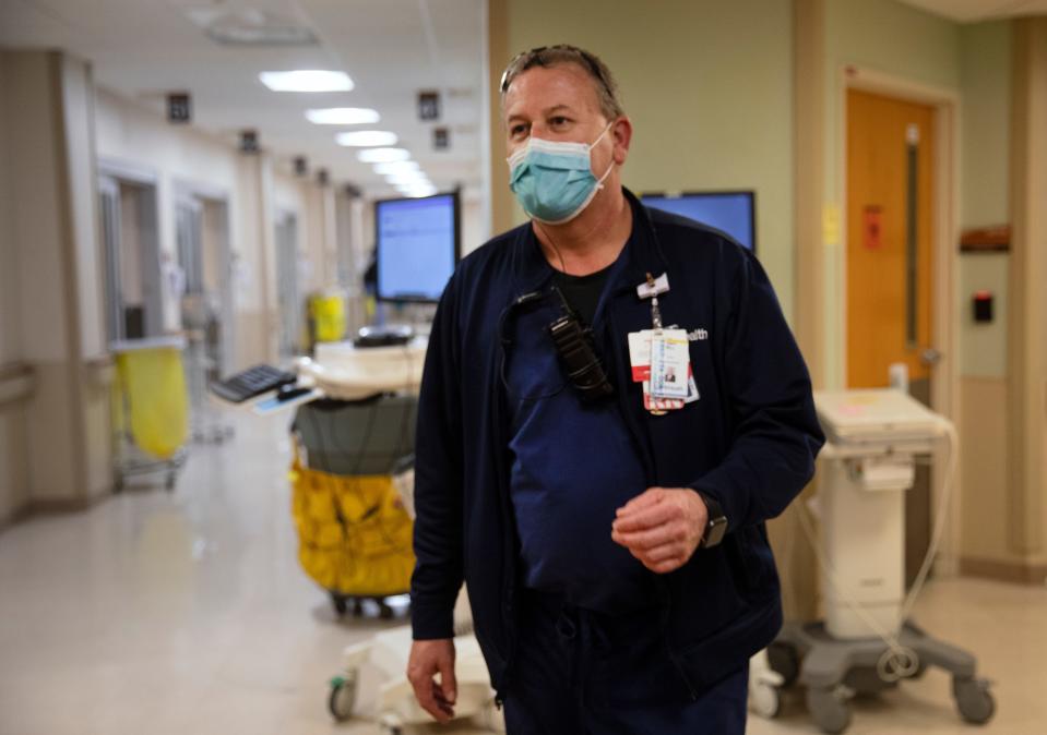 Bill Hawke puts in 50- to 60-hour weeks as a nurse manager in the emergency room department at Good Samaritan Hospital. COVID stress has been real for him and his staff.