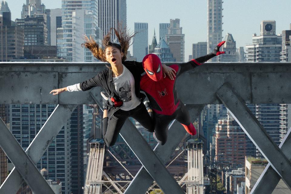 MJ (Zendaya) and Spider-Man (Tom Holland) jump off a bridge in "Spider-Man: No Way Home."