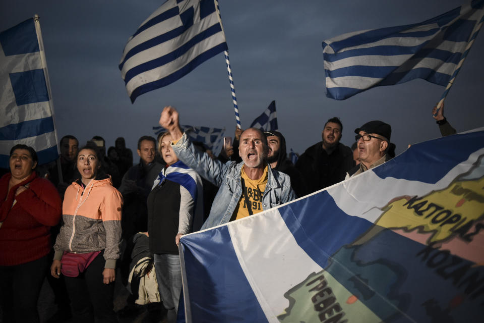 Greek protesters chant slogans against Greece's name deal with neighboring Macedonia, during a rally in the northern city of Thessaloniki, on Sunday, Sept. 30, 2018. A referendum on changing the nation of Macedonia's name to North Macedonia to pave the way for NATO membership attracted tepid voter participation Sunday, with turnout standing below 29 percent two hours before polls close. (AP Photo/Giannis Papanikos)