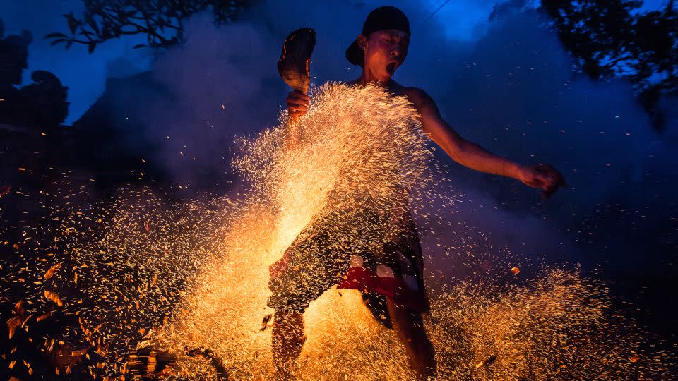 "Mesabatan Api" or "fire war" is another Ngrupuk tradition. - Agung Parameswara/Getty Images