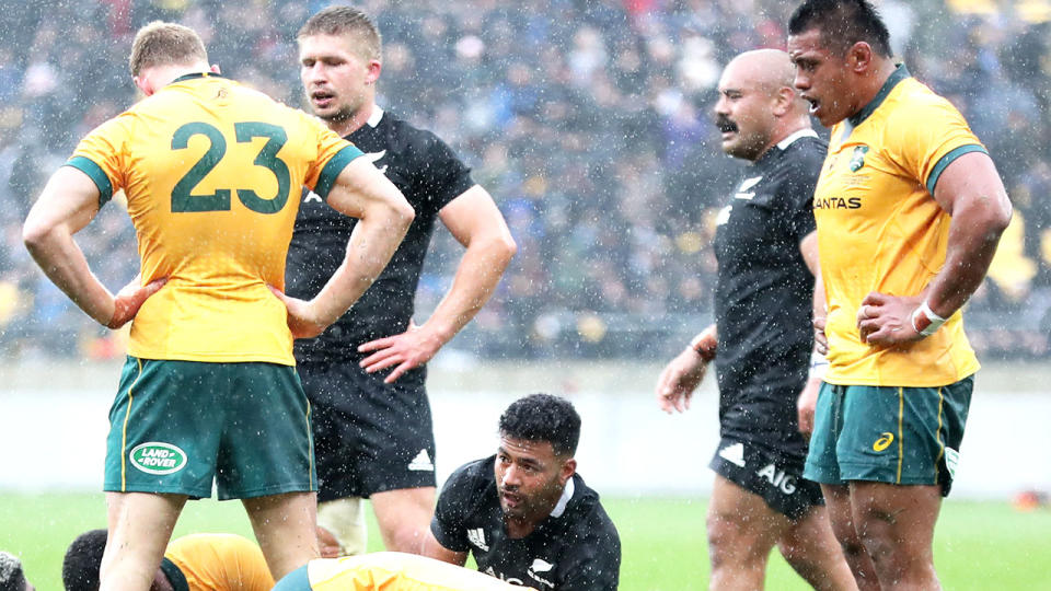 Wallabies and All Blacks players, pictured here after the full-time whistle in the opening Bledisloe Cup clash.