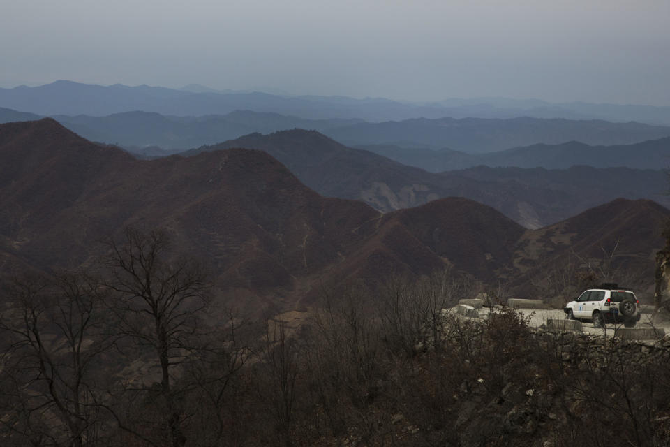 In this Nov. 6, 2013 photo, a World Food Program vehicle drives on a mountain road near the city of Kimchaek, in northeastern North Korea. A funding crunch for aid to North Korea has become so severe 500,000 rural schoolchildren are as of April 2014, no longer receiving assistance and aid to millions more could soon dry up, according to a report obtained by The Associated Press. The report underscores the flight of international donors to countries with less political baggage and more willingness to let aid workers do their jobs. (AP Photo/David Guttenfelder)