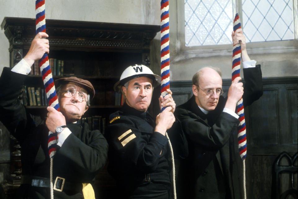 Williams, right, with Bill Pertwee as ARP warden Hodges and, left, Edward Sinclair - Television Stills