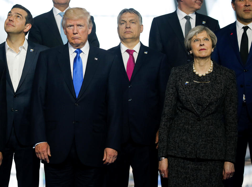 <p>(L-R) Greek Prime Minister Alexis Tsipras, U.S. President Donald Trump, Hungarian Prime Minister Voktor Orban and Britain’s Prime Minister Theresa May pose during a family photo at the start of NATO summit at their new headquarters in Brussels, Belgium, May 25, 2017. (Photo: Jonathan Ernst/Reuters </p>