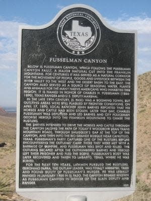 A historical marker notes the significance of Fusselman Canyon.