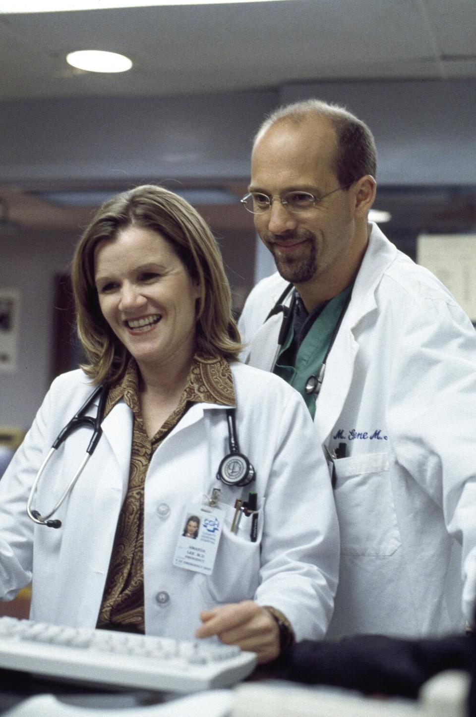 Two actors pose as doctors.