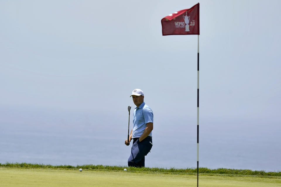 Jordan Spieth watches his shot on the 14th green during a practice round of the U.S. Open Golf Championship, Tuesday, June 15, 2021, at Torrey Pines Golf Course in San Diego. (AP Photo/Marcio Jose Sanchez)