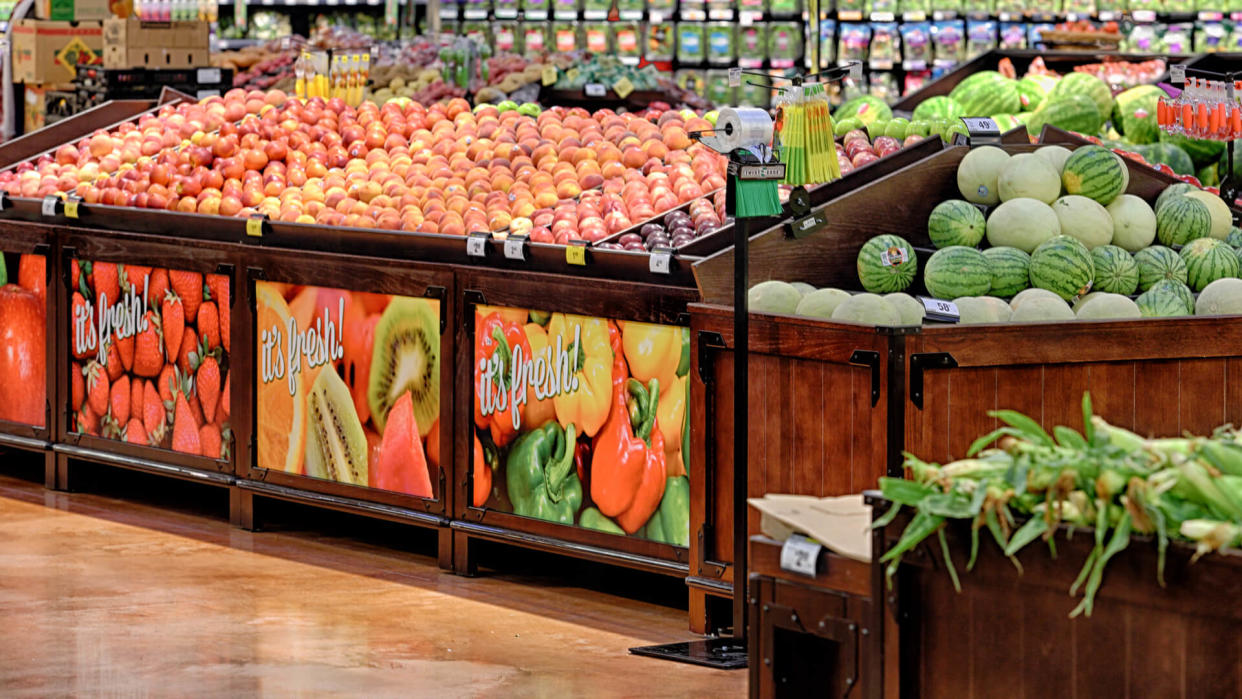 Provo, Utah, USA June 29, 2016 Fruits and vegitables displayed for sale in the produce department of a modern grocery store.