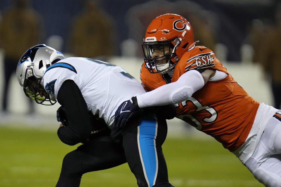 Chicago Bears linebacker T.J. Edwards (53) tackles Carolina Panthers quarterback Bryce Young during the first half of an NFL football game Thursday, Nov. 9, 2023, in Chicago. (AP Photo/Erin Hooley)