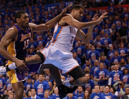 Los Angeles Lakers' Metta World Peace (L) fouls Oklahoma City Thunder's Thabo Sefolosha during game five of their NBA Western Conference series on May 21. The Thunder now face the top-seeded San Antonio Spurs for a place in the NBA finals