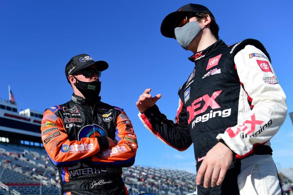 Cousins Jeb Burton and Harrison Burton talk on the grid prior to the NASCAR Xfinity Series Draft Top 250 at Martinsville Speedway on October 31, 2020 in Martinsville, Va.