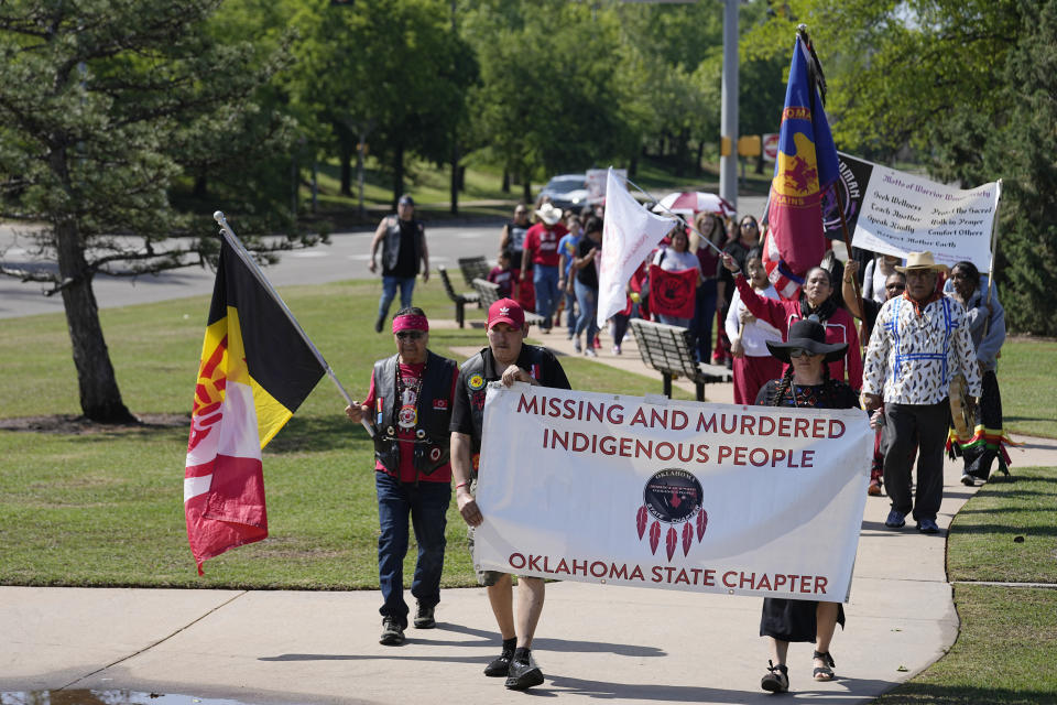 People participate in a memorial walk at the state Capitol on Missing and Murdered Indigenous Peoples Awareness Day, Friday, May 5, 2023, in Oklahoma City. (AP Photo/Sue Ogrocki)