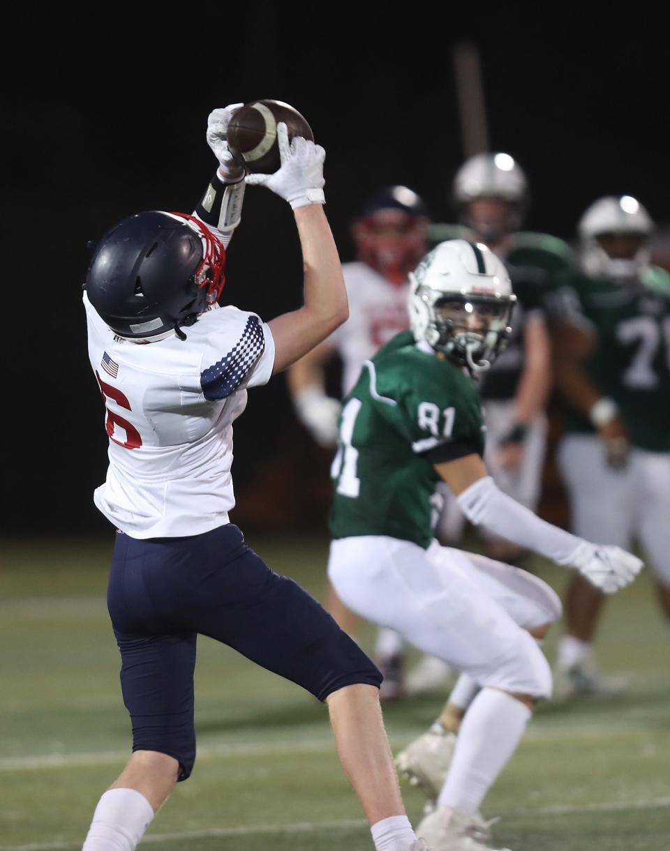 EastchesterÕs Kieran McCloskey (6) intercepts a Brewster pass during football action at Brewster High School Sept. 30, 2023. Eastchester won the game 21-0. 