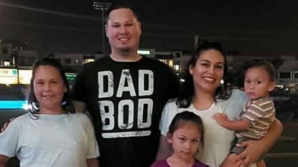 PHOTO: Kody and Jazmin Kirkland pose with their three children. (Kody Kirkland)