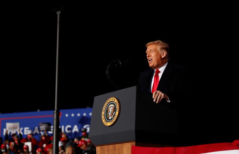 FILE PHOTO: U.S. President Donald Trump holds a campaign event at the Central Wisconsin Airport in Mosinee, Wisconsin