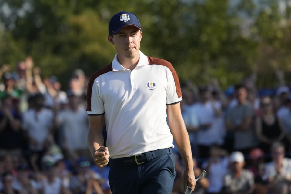 Europe's Matt Fitzpatrick celebrates on the 13th green after putting during his afternoon Fourballs match at the Ryder Cup golf tournament at the Marco Simone Golf Club in Guidonia Montecelio, Italy, Saturday, Sept. 30, 2023. (AP Photo/Andrew Medichini)