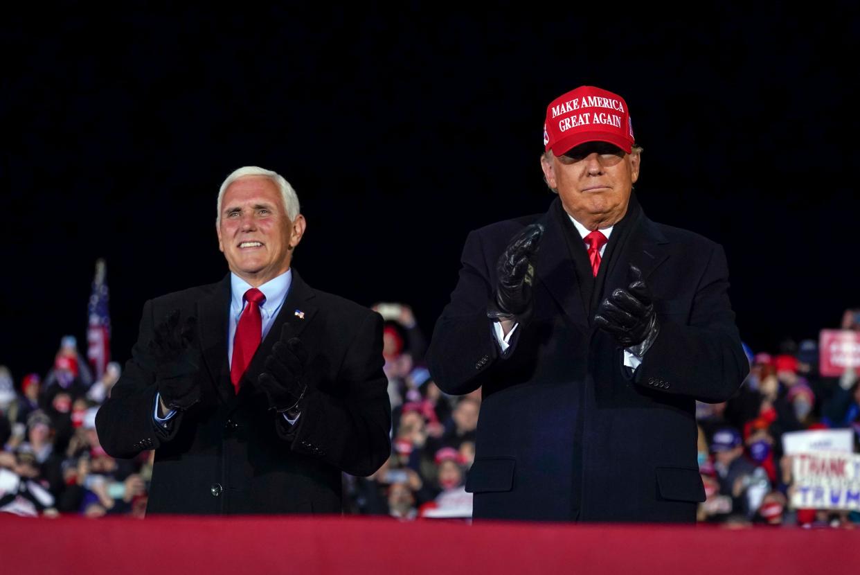 Mike Pence and Donald Trump on the eve of the 2020 election (AP)