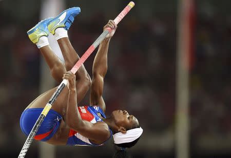 Yarisley Silva of Cuba competes in the women's pole vault final during the 15th IAAF World Championships at the National Stadium in Beijing, China, August 26, 2015. REUTERS/Dylan Martinez