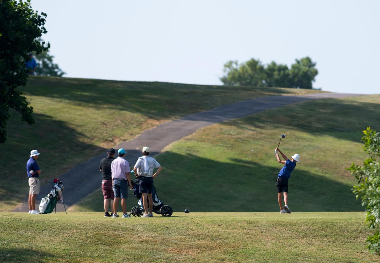 Participants tee off on the 11th Holdens during the Evansville Men's City Golf Tournament qualifying round at Helfrich Hills Golf Course in Evansville, Ind., Saturday morning, July 2, 2022. 