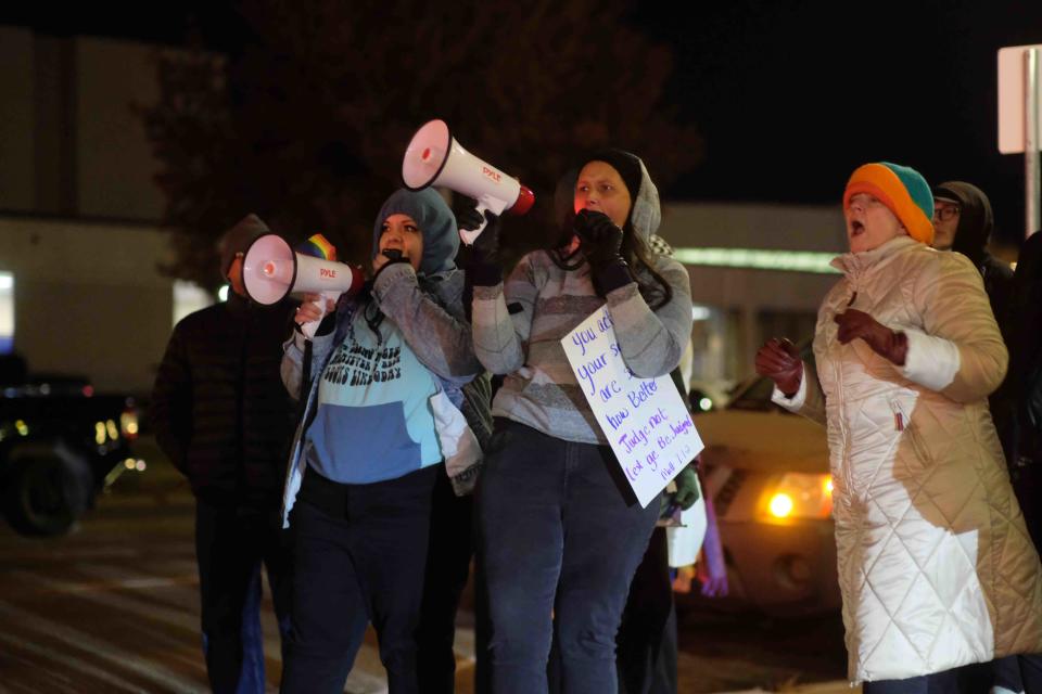Local activists trade vocal barbs with protesters of a Christmas drag show Tuesday outside of the Globe-News Center for the Performing Arts in downtown Amarillo.