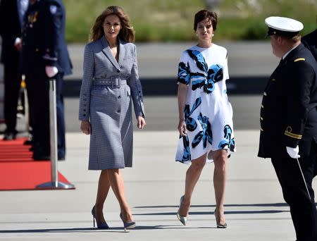 U.S. First lady Melania Trump (L) walks with Amelie Derbaudrenghien, partner of Belgian's Prime Minister Charles Michel, at the Brussels Airport in Brussels, Belgium, May 24, 2017. REUTERS/Hannah McKay