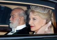 <p>Prince and Princess Michael of Kent, en route to the palace. Princess Michael has paired a collared blush outfit with a pearl-fringed tiara.</p>