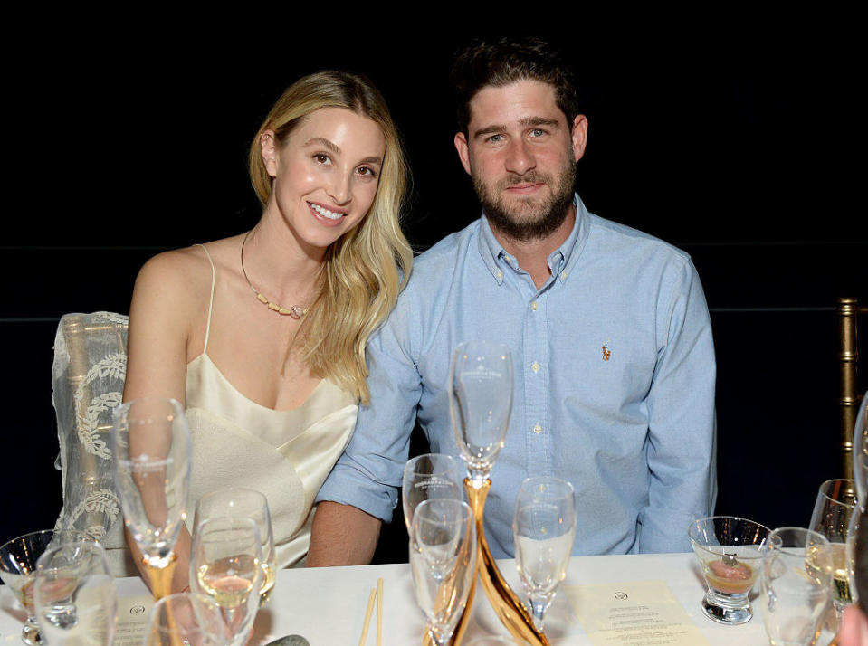 Whitney Port and Tim Rosenman smiling at dinner