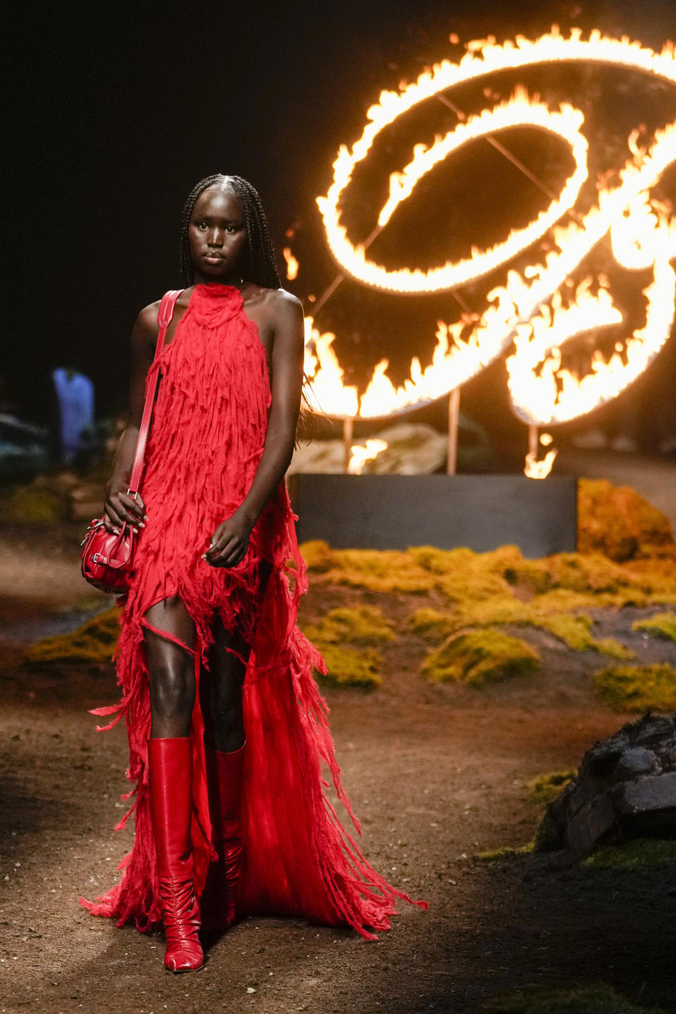 A model wears a creation as part of the Blumarine women's Fall-Winter 2023-24 collection presented in Milan, Italy, Thursday, Feb. 23, 2023. (AP Photo/Luca Bruno)