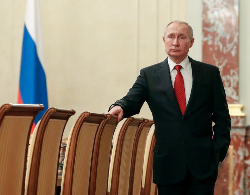 Russian President Putin attends a meeting with government members in Moscow