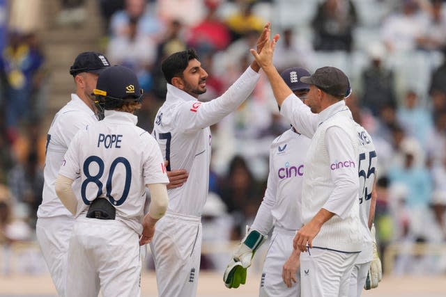 England’s Shoaib Bashir, (centre) took five wickets in India's first innings in the fourth Test