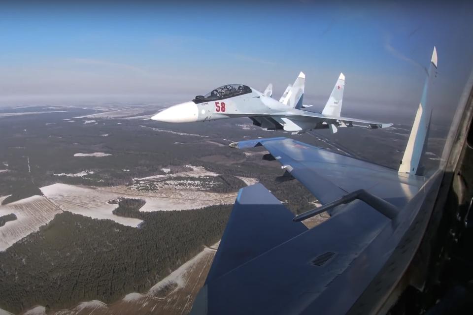 FILE - In this photo taken from video provided by the Russian Defense Ministry Press Service on Thursday, Feb. 17, 2022, Su-30 fighters of the Russian and Belarusian air forces fly in a joint mission during the Union Courage-2022 Russia-Belarus military drills in Belarus. Belarus President Alexander Lukashenko has welcomed thousands of Russian troops to his country, allowed the Kremlin to use it to launch the invasion of Ukraine on Feb. 24, 2022, and offered to station some of Moscow’s tactical nuclear weapons there. But he has avoided having Belarus take part directly in the fighting – for now. (Russian Defense Ministry Press Service via AP, File)
