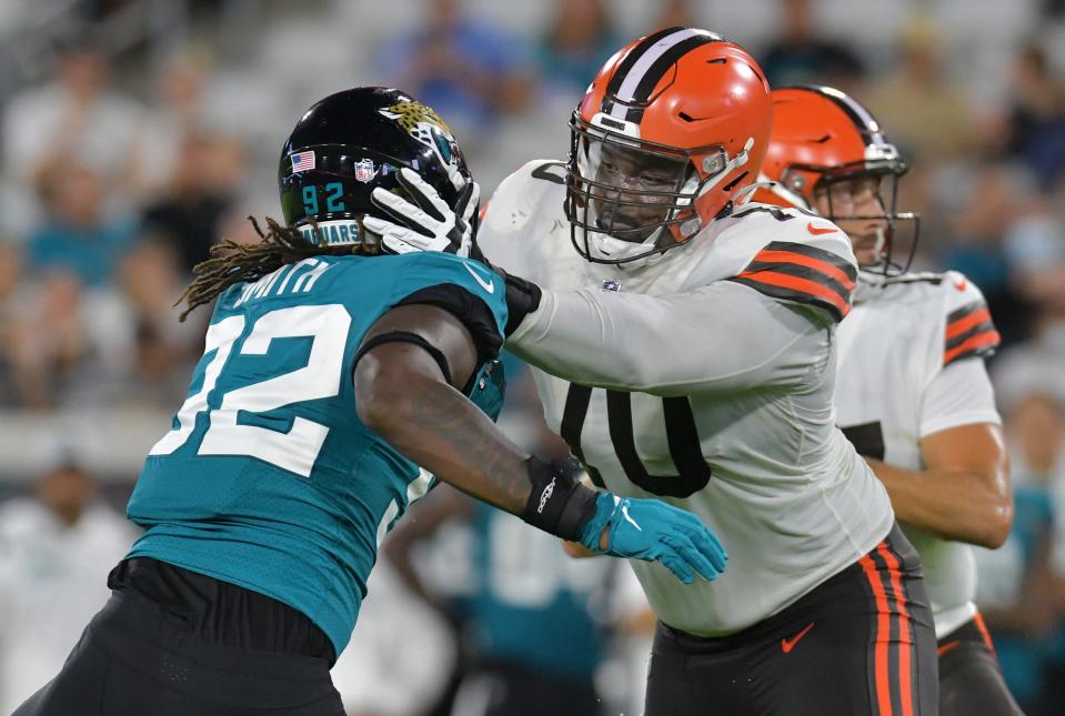 Jordan Smith, rushing against Cleveland tackle Greg Senat, had nine tackles in three preseason games.