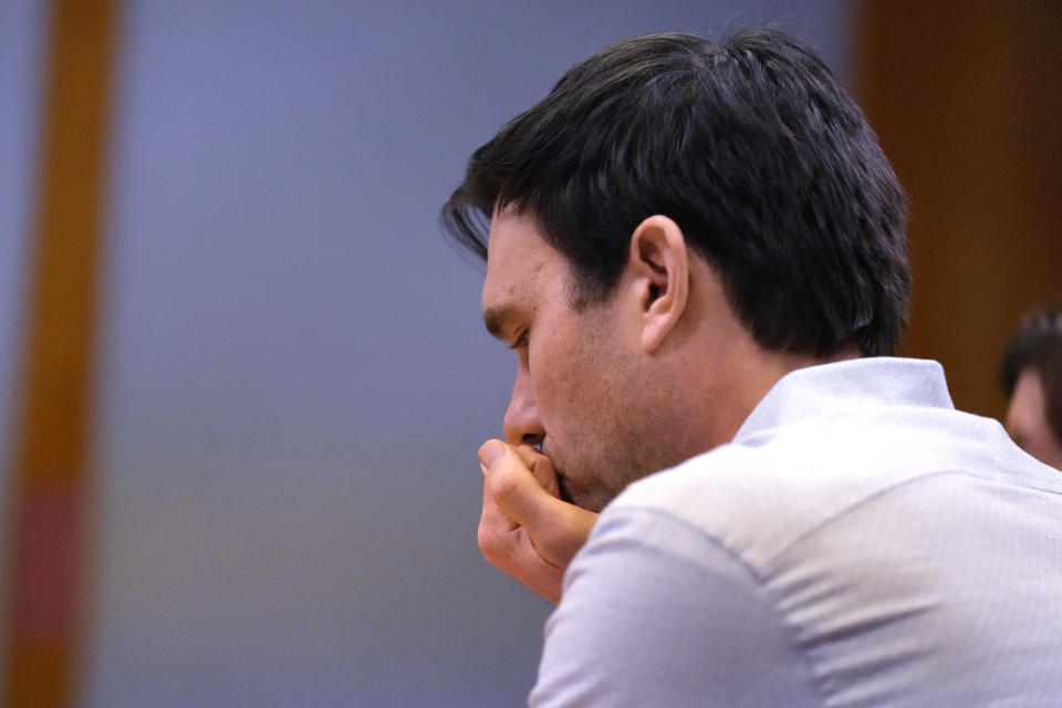 James Parker waits as the parole board deliberates during his parole hearing, Thursday, April 18, 2024, in Concord, N.H. Parker who served more than half of his life in prison for his role in the 2001 stabbing deaths of two married Dartmouth College professors as part of a plan to rob and kill people before fleeing overseas has been granted parole. (AP Photo/Charles Krupa)