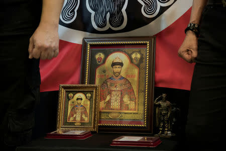 Icons of Tsar Nicholas II are seen at the art studio of Igor Miroshnichenko, a member of the Union of Orthodox Banner-Bearers, during a meeting of the members in Moscow, Russia, July 12, 2018. The Union of Orthodox Banner Bearers is a small fringe group of Russian nationalists with no political power that is convinced Russia should be ruled by an autocratic monarch. REUTERS/Ekaterina Anchevskaya