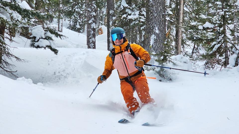 Woman wearing Ortovox Mesola ski jacket for skiing